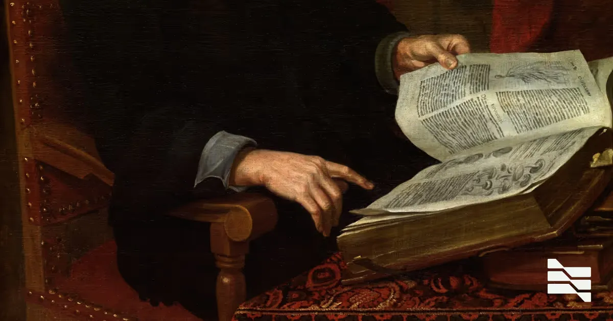 A person reading a large old ledger book at a desk